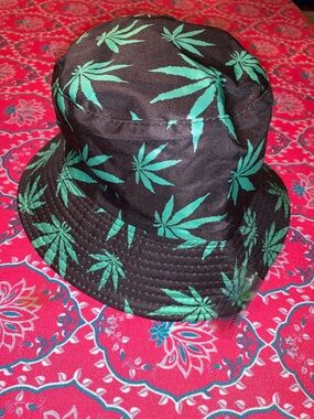 NWT Bucket Hat, One Sz.  Black with Green Pot Leaves.